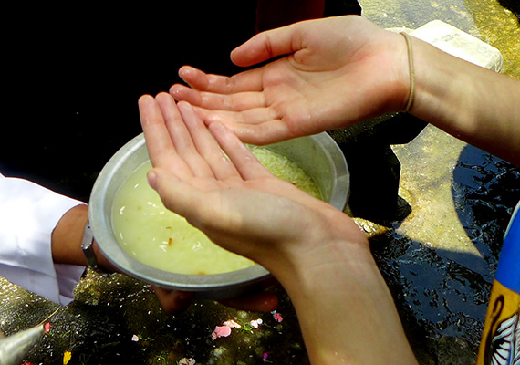 Throughout the Malukat Ceremony we were immersed with the holy water three times as well as drinking and washing our face three times.